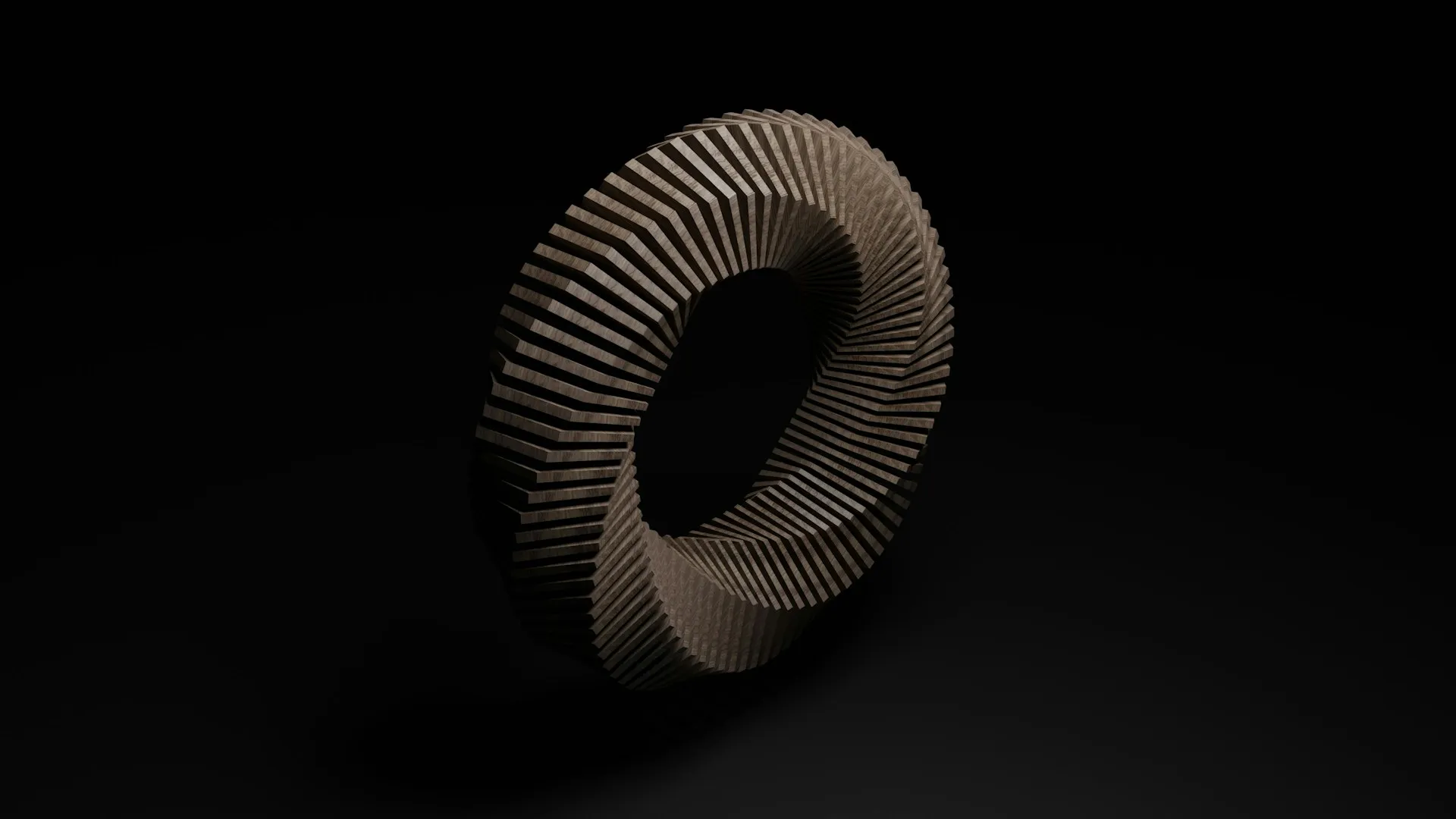 A stylized rendering of a cog, on black background.